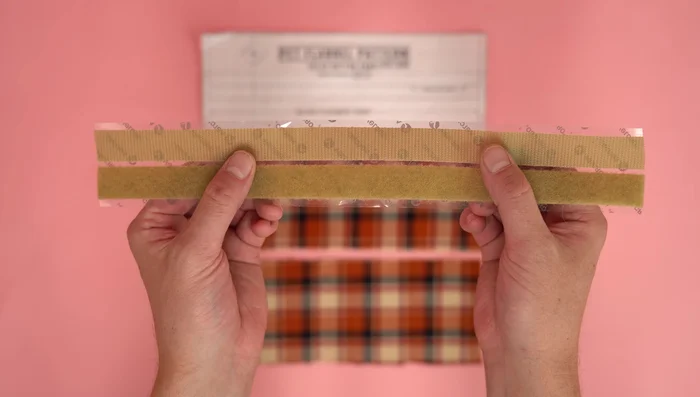 Assemble the velcro panels: Attach velcro strips to velcro panels, stitch down. Fold in half, right sides together, stitch outside edges at 1/4 inch seam allowance. Clip corners, flip right side out, topstitch around the outside edge, leaving the bottom open.