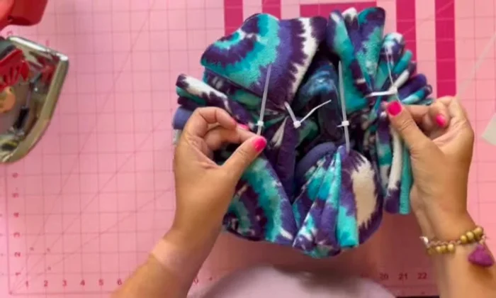 Connect layers: Use another zip tie to connect all the loosely closed layers together.