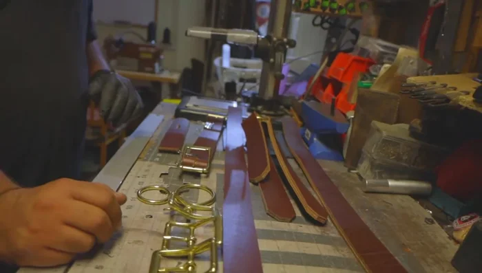 Prepare pre-cut leather straps: belly strap, shoulder straps, handle, chest plate straps, and back strap.