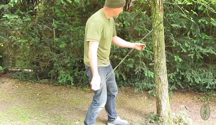 Pass the measured length of paracord through the stainless steel clip. Tie off the two ends securely using a simple overhand knot.