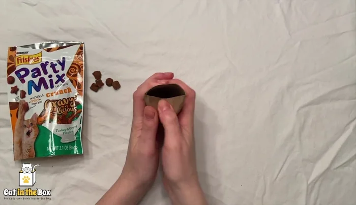 Pinch the sides of both ends.