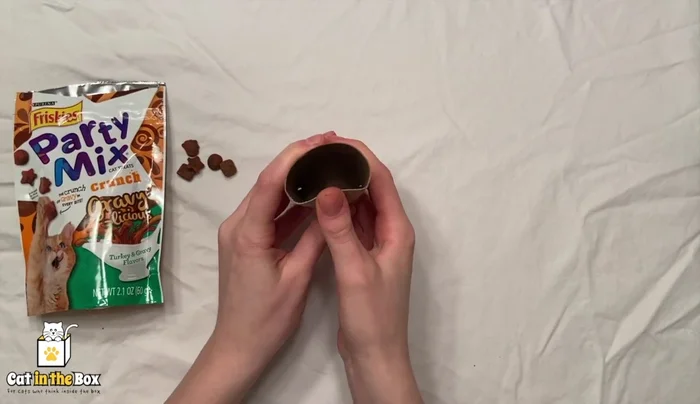 Pinch the sides of both ends.