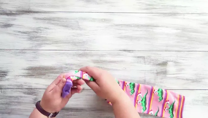 Tie a couple more knots a short distance apart.