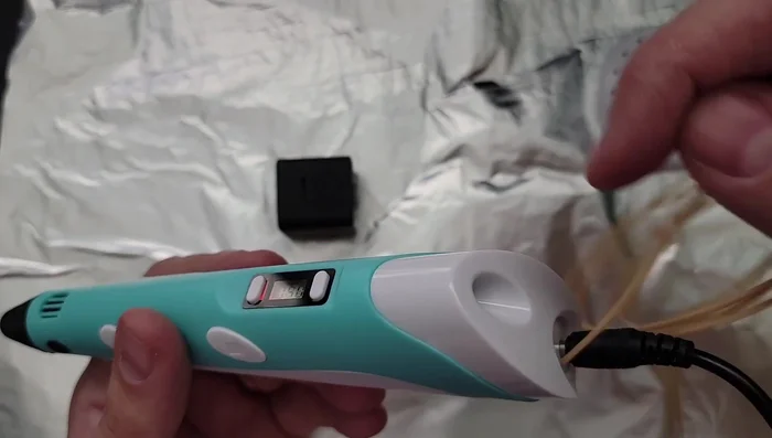 Prepare your workspace: Cover your desk with aluminum foil and have a paper towel handy to wipe away excess plastic.