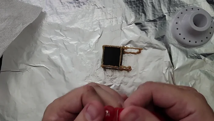 Attach the collar: Slip the tall front support through the collar's size adjustment area, ensuring the collar can close in a loop away from the camera.