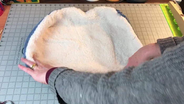 Sew side seams: Measure 5in from each side and sew a line between the two corners. Leave a 2in gap on each side of the corner to allow for stuffing.