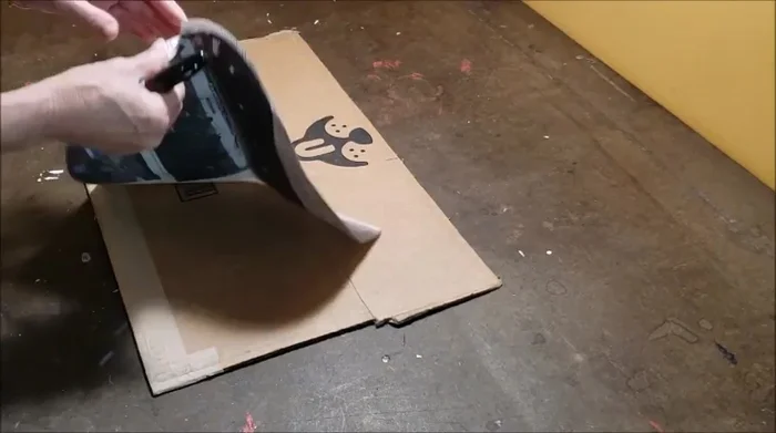 Cut two oval pieces of fabric (from an old t-shirt) using the foam as a template. Sew the two layers together, leaving a gap for stuffing. Add stuffing and finish sewing. Note: add extra allowance to the template to account for shrinkage.