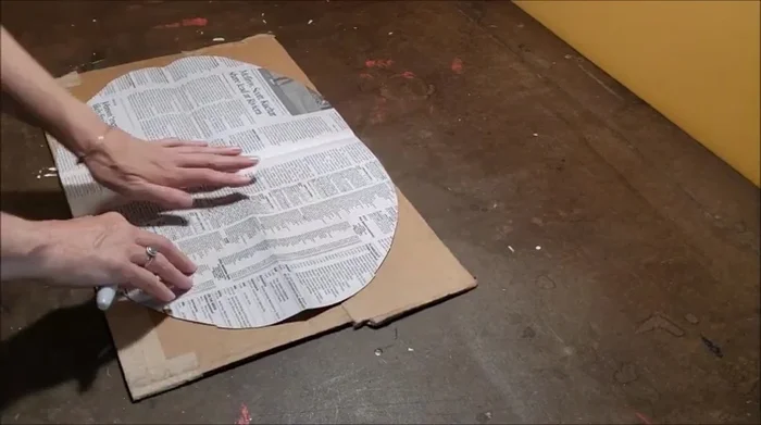 Cut two oval pieces of fabric (from an old t-shirt) using the foam as a template. Sew the two layers together, leaving a gap for stuffing. Add stuffing and finish sewing. Note: add extra allowance to the template to account for shrinkage.