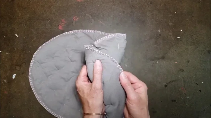 Place the foam padding into the basket, followed by the fabric pad.