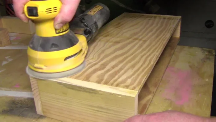 Fill holes and imperfections with spackle and sand smooth for a clean finish.