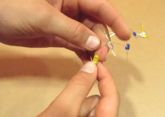 Secure the wires: Use tape to keep the wires organized and spaced to prevent short circuits. Don't tape the wires together.