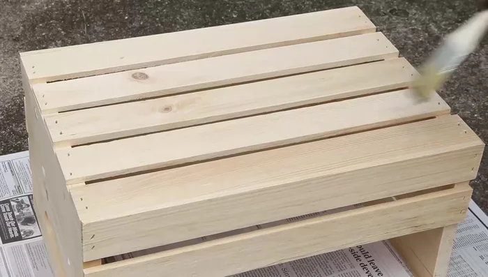 Apply wood glue to the back of each letter and press into place.