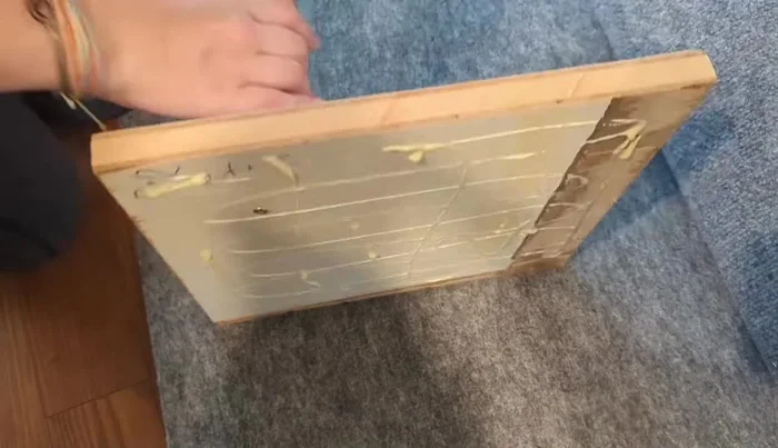 Attach Lofts: Attach the carpeted lofts to each other using screws and pre-drilled pilot holes.