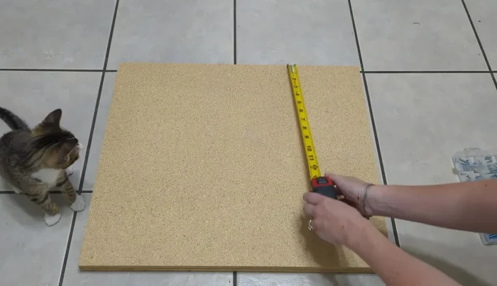 Carpet Base and Platform: Cover the base and platform with carpet, stapling securely to create a flush fit.