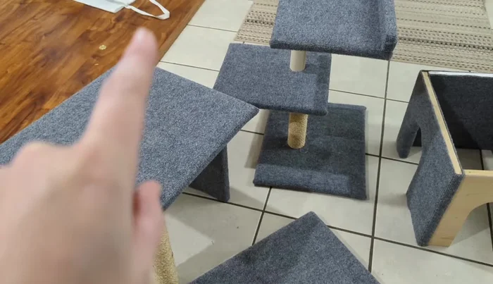 Attach Ramp: Using hinges, attach the ramp to the platform.