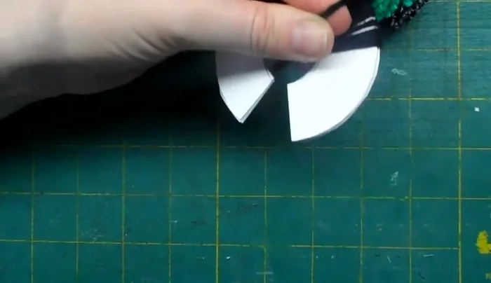 Tie off the black yarn securely.