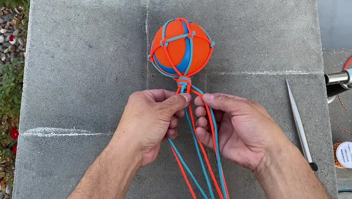 Tie the Diamond Knot: Create a Diamond Knot at the end of the braid to finish the rope.