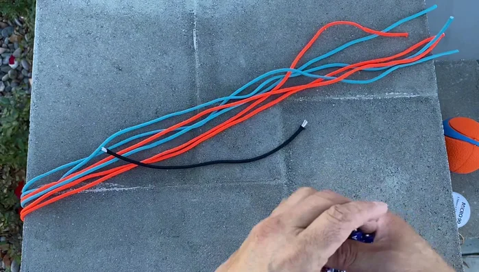 Secure the core: Wrap the bundled cords tightly with micro 90 cord at least three times. Secure the end by slipping it through the wrap and tightening.