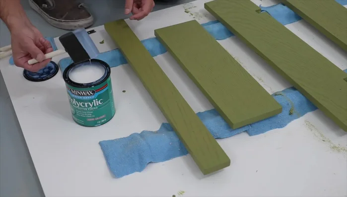 Apply Minwax Polycrylic clear ultra-flat coat, ensuring consistent application and avoiding build-up. Let cure overnight.