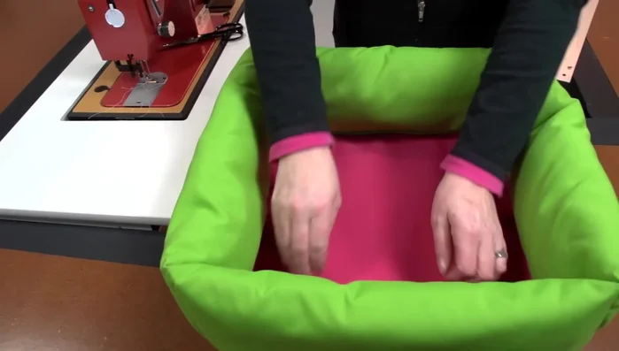 Turn the dog bed right side out.