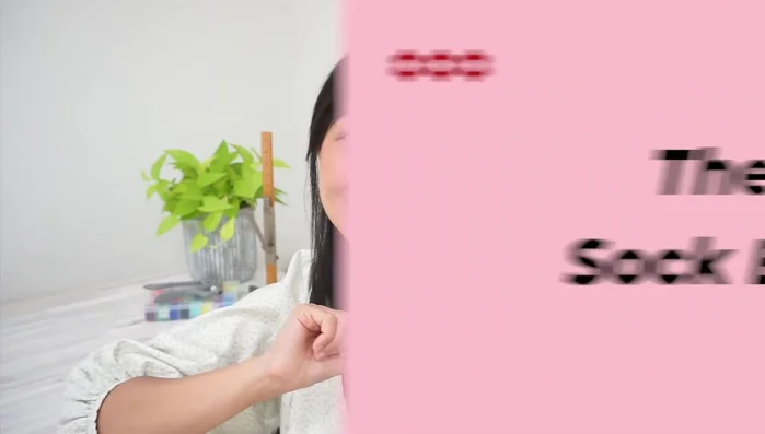 Tie a knot to secure the toy.