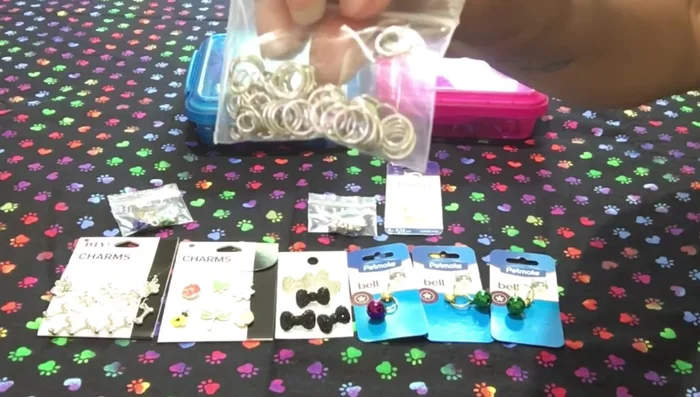 Connect the charm's jump ring to the lobster clasp's jump ring.