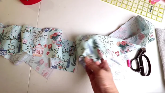 Sew the side piece into a tube, right sides together.