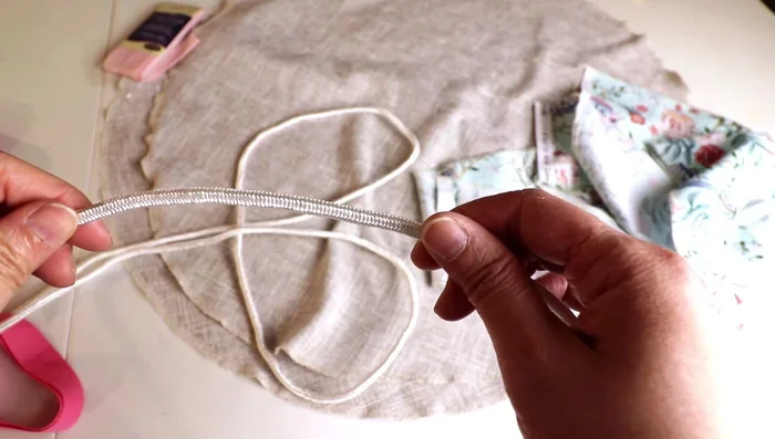 Make piping: Insert cord into bias tape, then sew close to the cord.