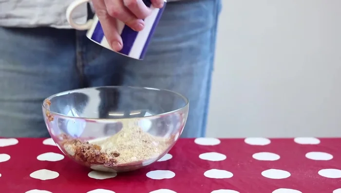 Knead the ingredients with your hands until a slightly damp dough forms.