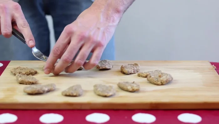 Shape the balls into your desired cookie shape, ensuring they are not too thick.
