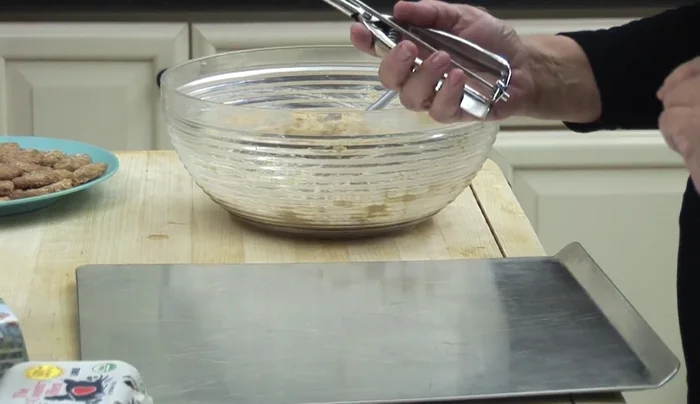 Optional: Use a little extra flour to create thumbprint designs on some of the cookies.