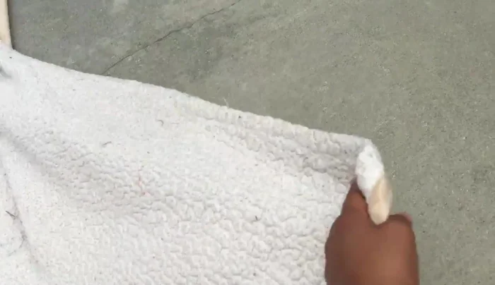 Wrap the blanket around the pillow like a burrito.