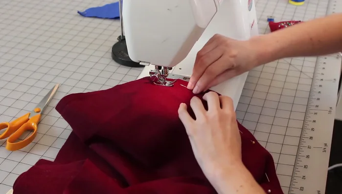 Sew left and right sides of hood body pieces together for both lining and outer fabric. Iron seams.