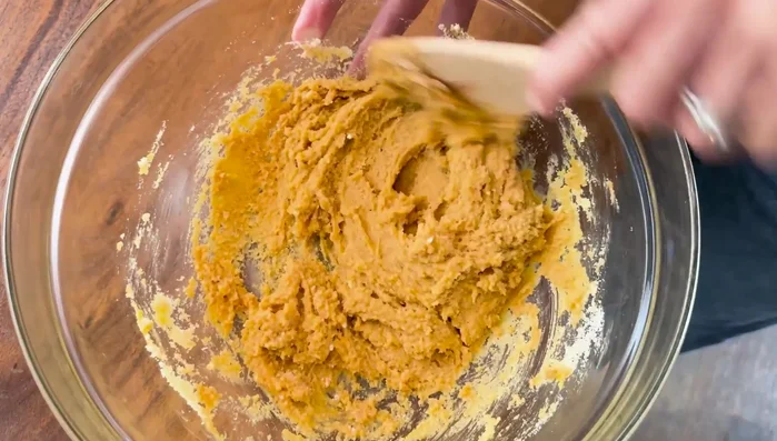 Mix thoroughly until a sticky dough forms.