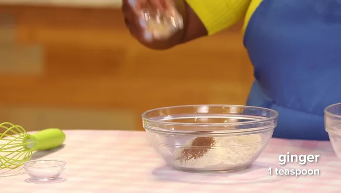 Pour batter into a greased dog-shaped cake pan and bake at 350°F for 20-25 minutes.