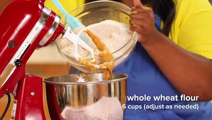 Gradually add flour to the wet ingredients, mixing until a soft dough forms (you may not need all 6 cups).