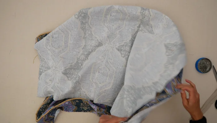 Attach bottom to sides: Sew the bottom piece to the side pieces with 1/2 inch seam allowance, keeping zipper partially open. Turn right side out and insert foam.