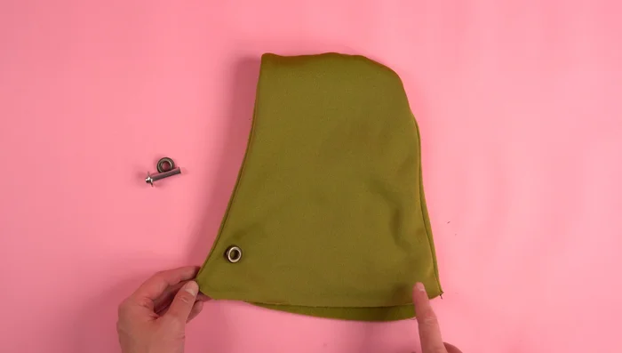Add Eyelets (Optional): Attach eyelets to the hood for a drawstring.
