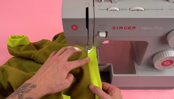 Add Top Stitching: Add top stitching to the waistband and cuffs for reinforcement and a professional finish. Consider breaking up long top stitches on stretchy areas to prevent breakage.