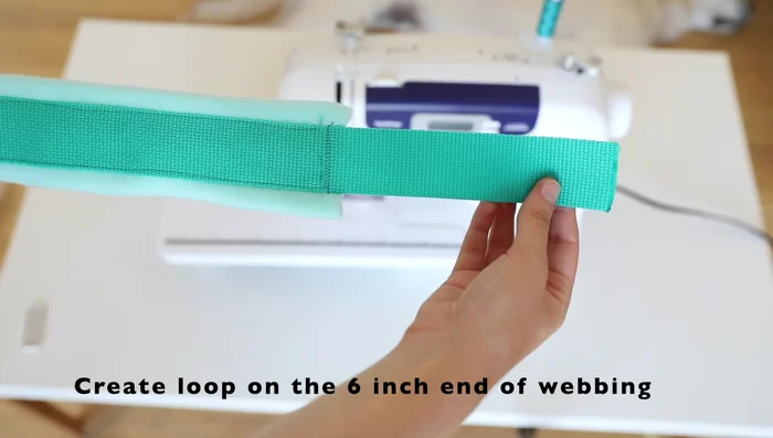 Attach tri-glide to the other end (3-inch end) of the chest strap; reinforce with stitches.