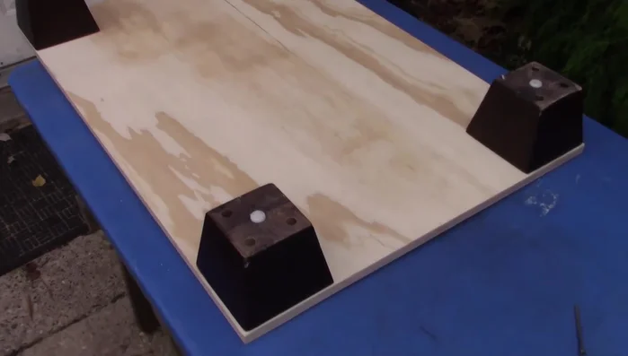Optional: Paint or stain the platform (not done in the video).