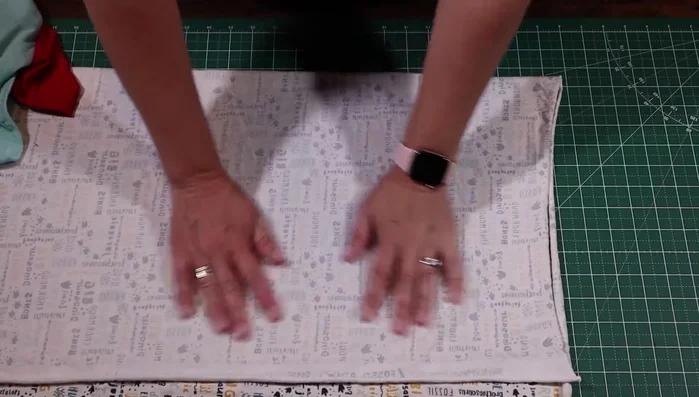 Cut out the shirt pieces: Cut out the main body of the shirt, remembering seam allowances. Create the armholes using your finger as a guide, add seam allowance, and cut.