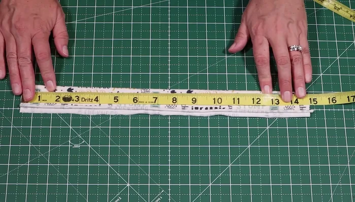 Sew the neckband: Measure the dog's neck. Construct a neckband, sew it into a tube, and attach it to the neckline of the shirt.