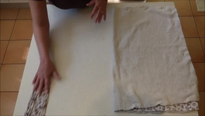 Prepare the ribbons: Cut eight strips of fabric (or use ribbon) measuring 35 centimeters (14 inches) long and 4 centimeters (1.5 inches) wide. Iron and fold each strip in half lengthwise, then sew the edges together to create a 1-centimeter (0.5-inch) wide ribbon. Seal the raw edges with a lighter (optional) to prevent fraying.