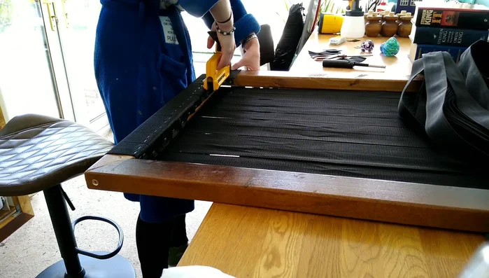 Add upholstery tacks to the ends of the straps for a finished look (optional).