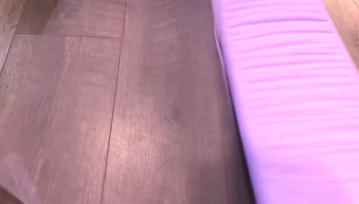 Prepare tulle strips. Fold over the folded end to remove excess fabric. Cut approximately 4 inches to achieve desired width.