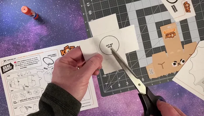 For pieces with holes (like the head insert), fold in half, cut the half-circle, then unfold for the hole.