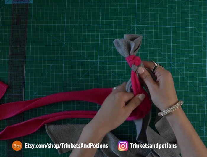 Tie off the braid: Once braided, tie all the ends together with a very tight and secure overhand knot.