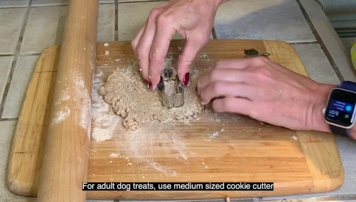 For adult dogs, use a medium-sized cookie cutter. Put treats onto a 9x14 baking pan lined with parchment paper.