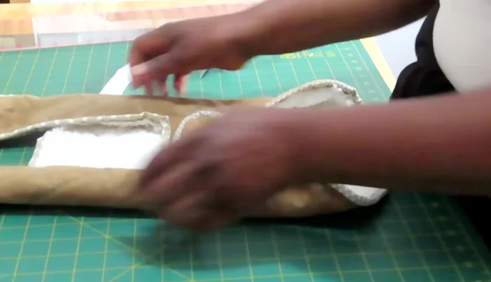 Attach Velcro to the coat's edges for fastening.